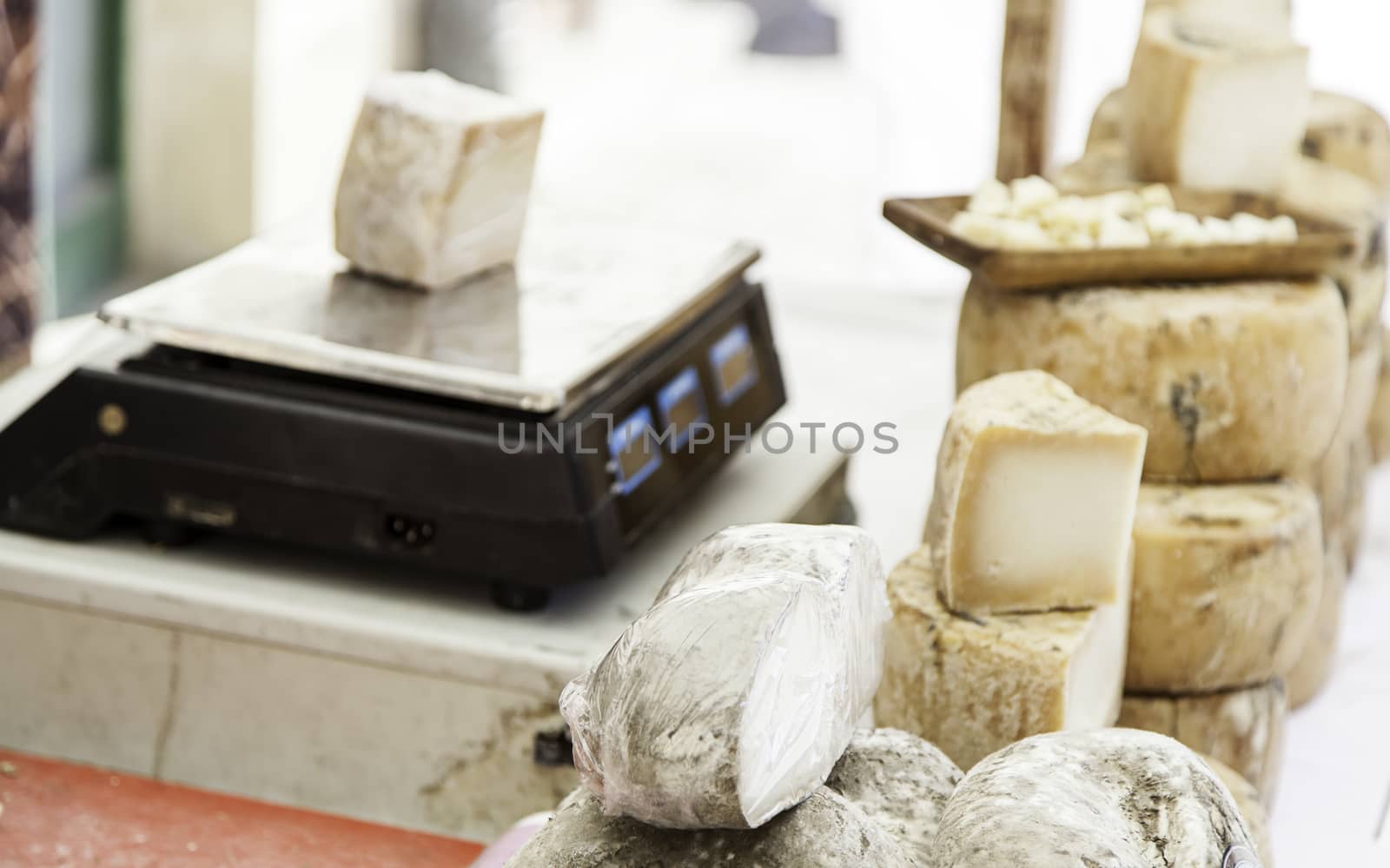 Artisan cheese in a market, detail of food, food and tradition, dairy product