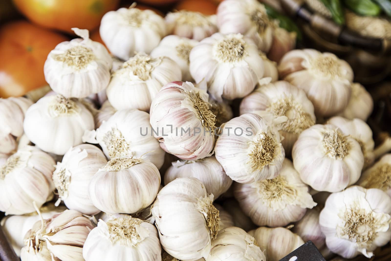 Garlic in a market, detail of some fresh garlic, healthy food