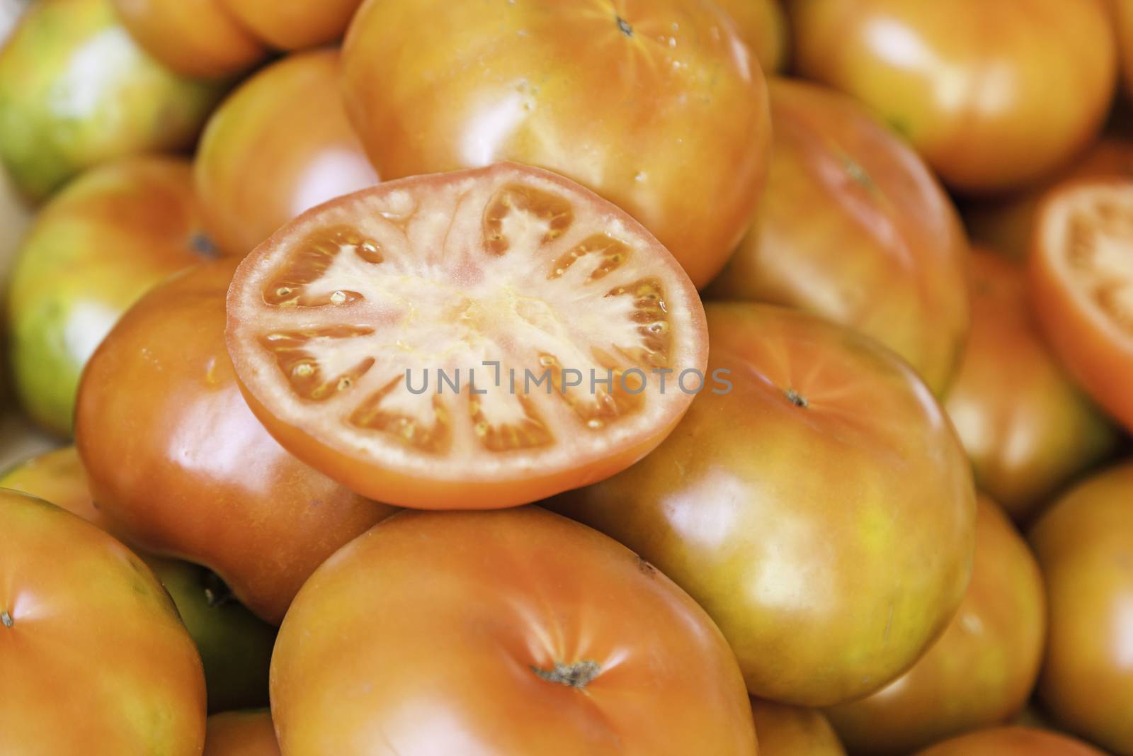 Tomatoes in a market, detail of a vegetable, ecological agriculture