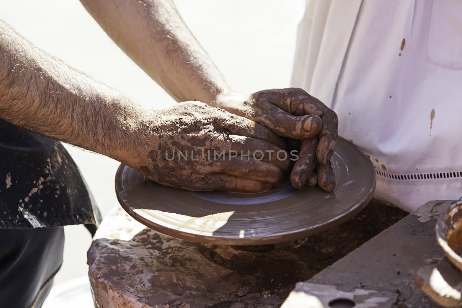 Clay artist, detail of a handyman, craft