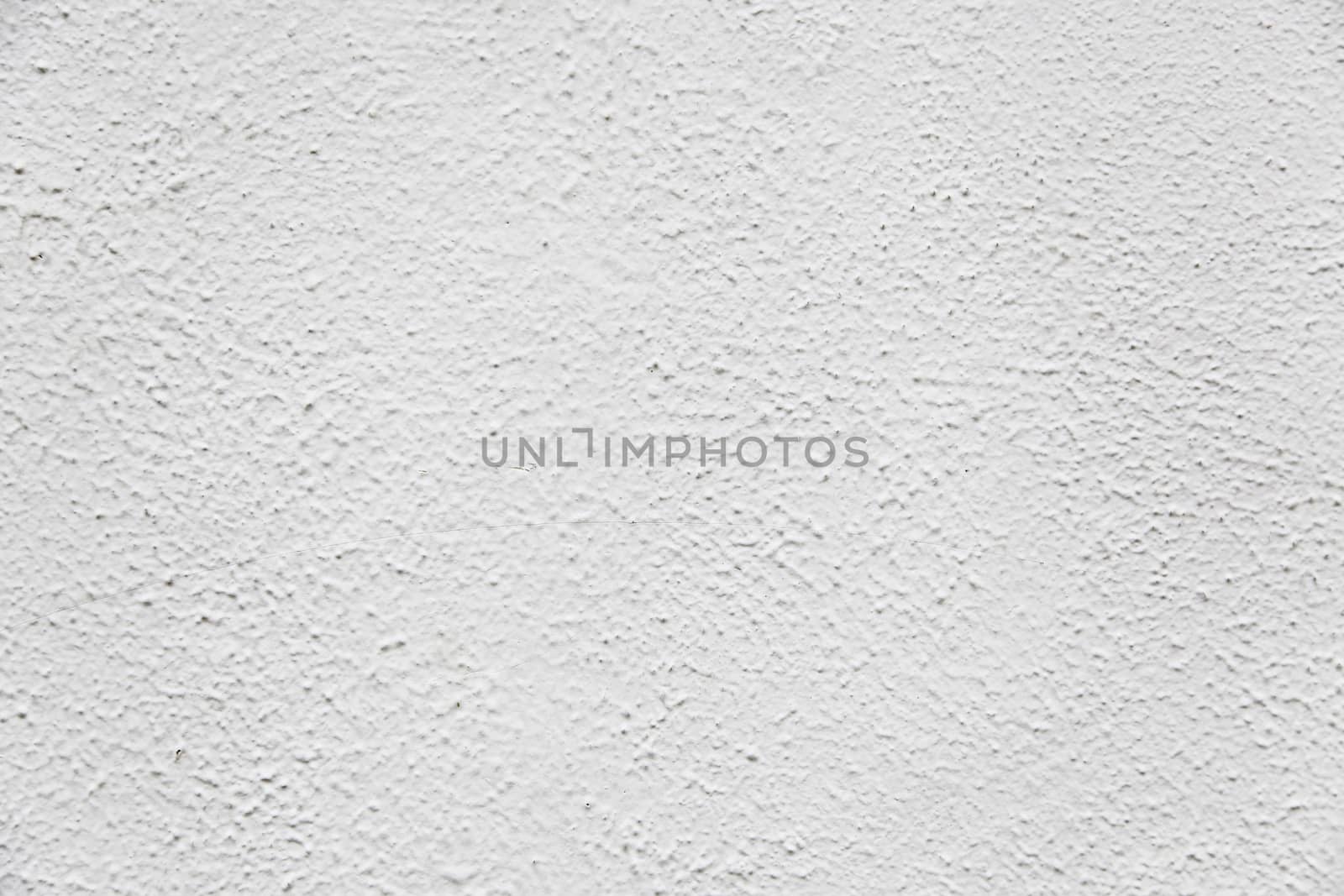 Rough white wall, detail a textured background, exploration