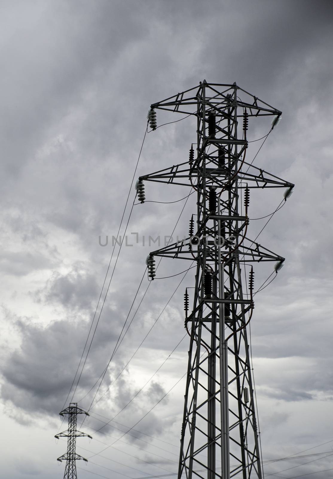 Towers of electricity, detail of energy transport, power and danger