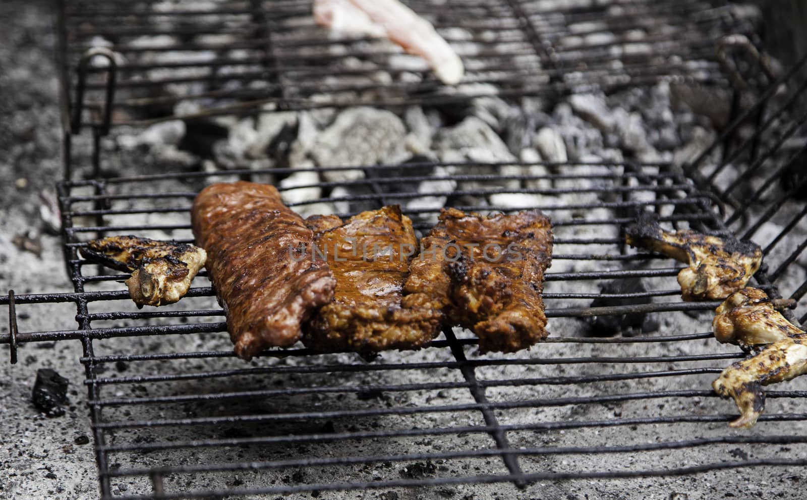 Grilled meat, grilled meat detail on a grill, healthy food, party and celebration