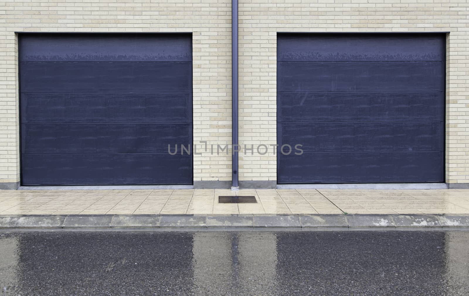 Garage doors, detail of doors in a house, parking for cars, protection and security