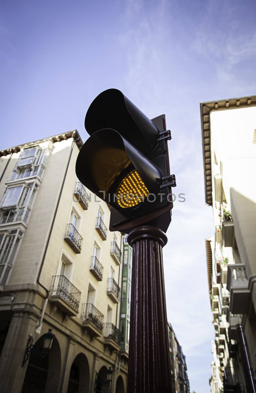 Red traffic light for cars, detail of a traffic signal, prohibition