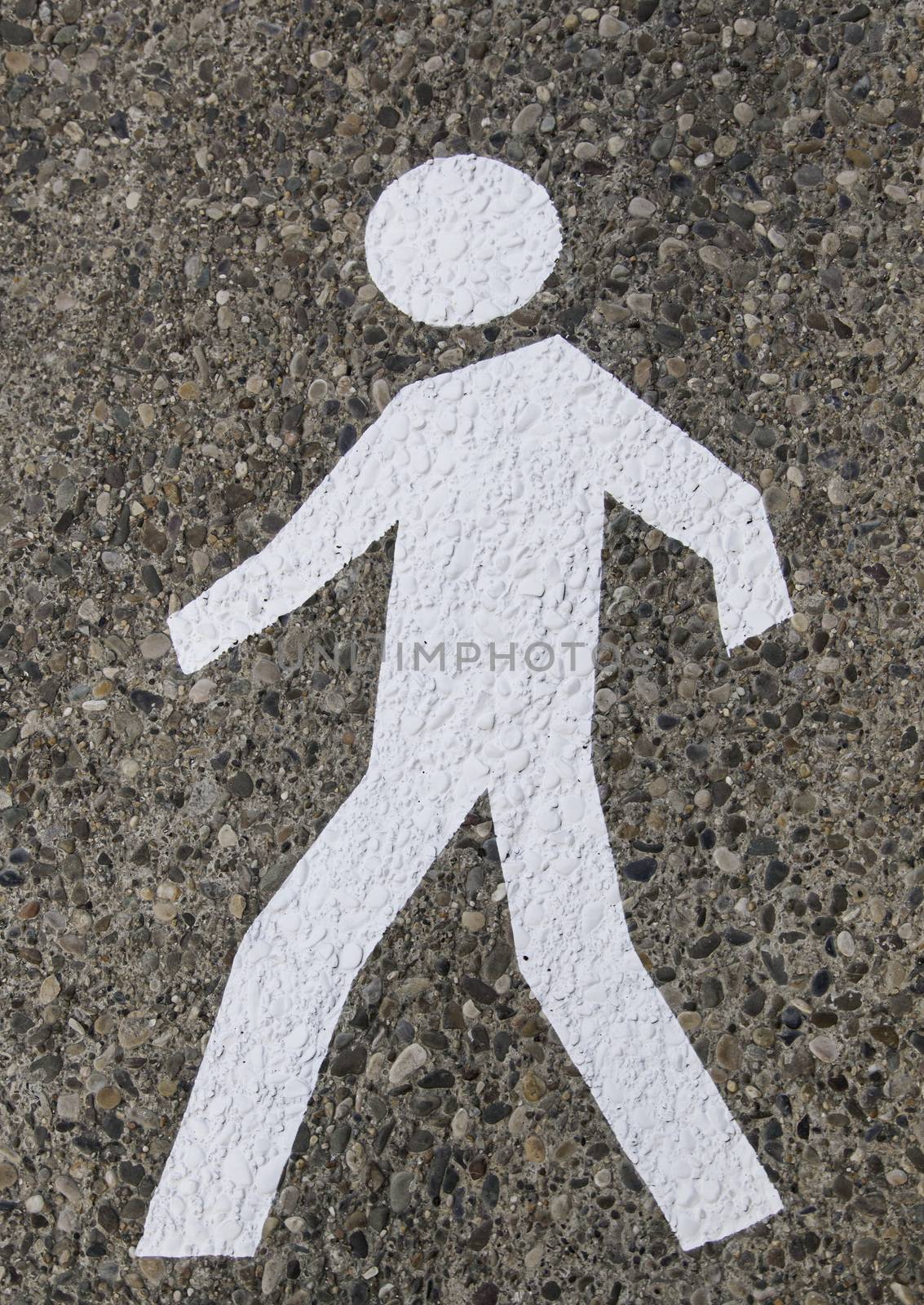 Pedestrian on the asphalt, detail of an area for pedestrian use, information and security