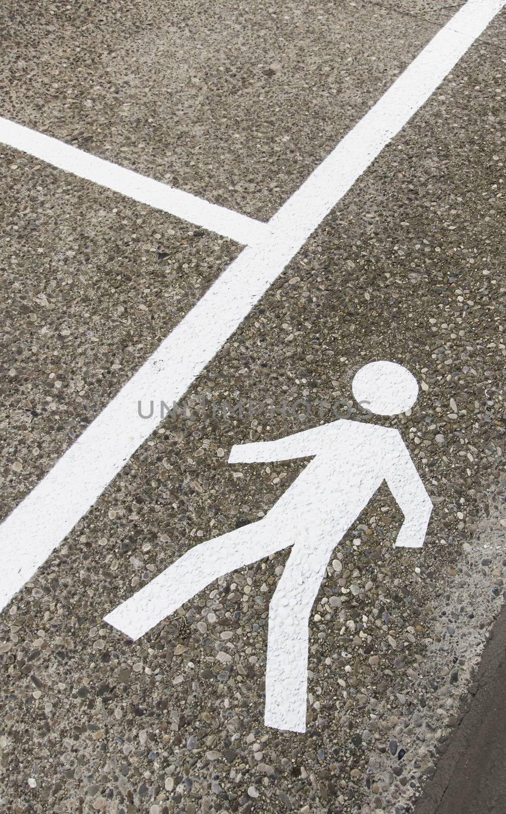 Pedestrian on the asphalt, detail of an area for pedestrian use, information and security