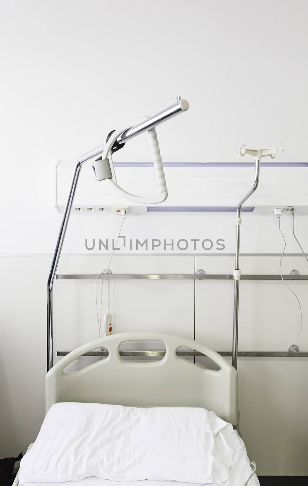 Bed in a hospital, detail of a room in a hospital, medicine and healing, illness