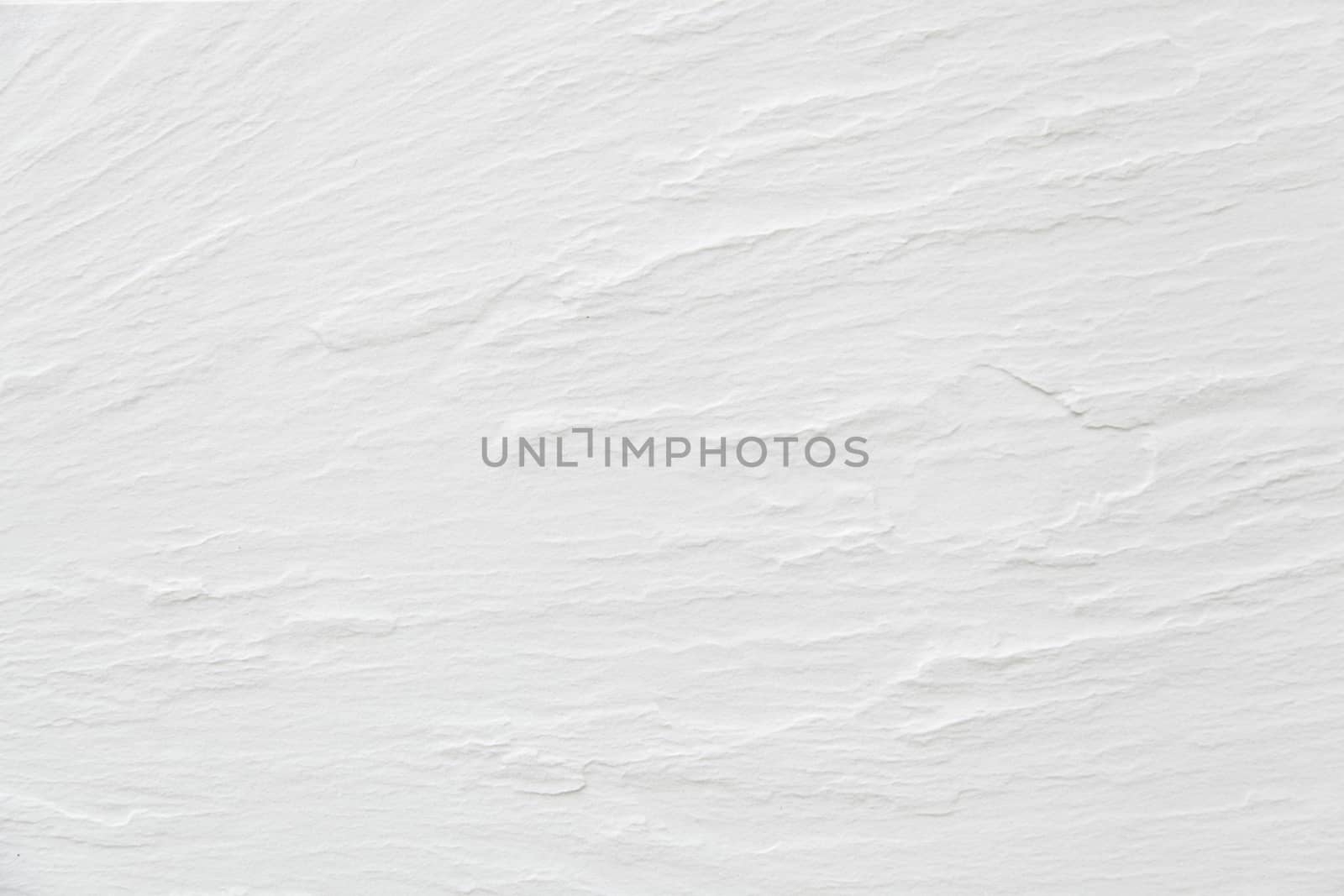White wall texture, detail of a relief wall