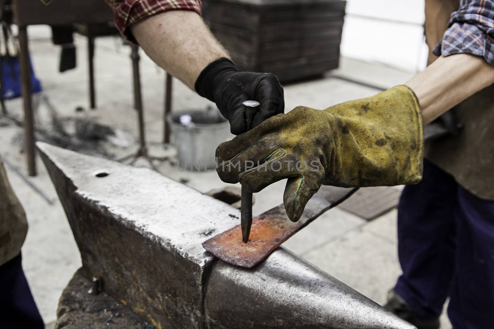 Red hot iron in a forge, working with hot iron, traditional work