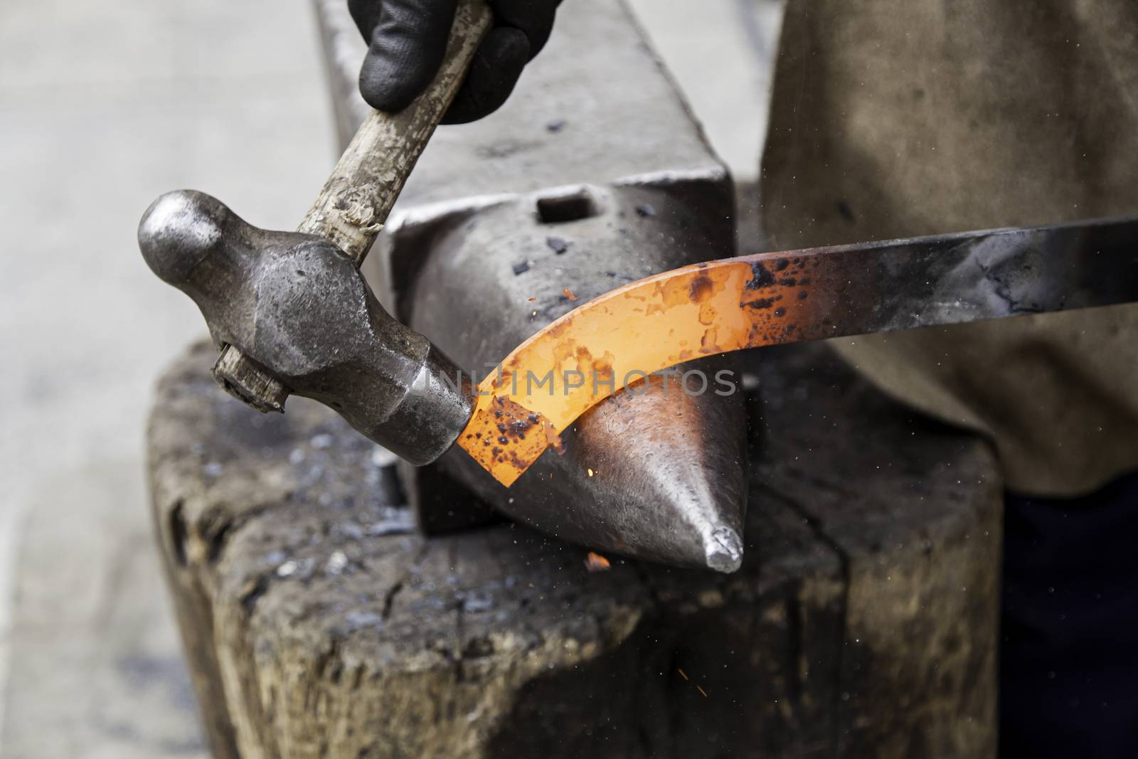 Red hot iron in a forge, working with hot iron, traditional work