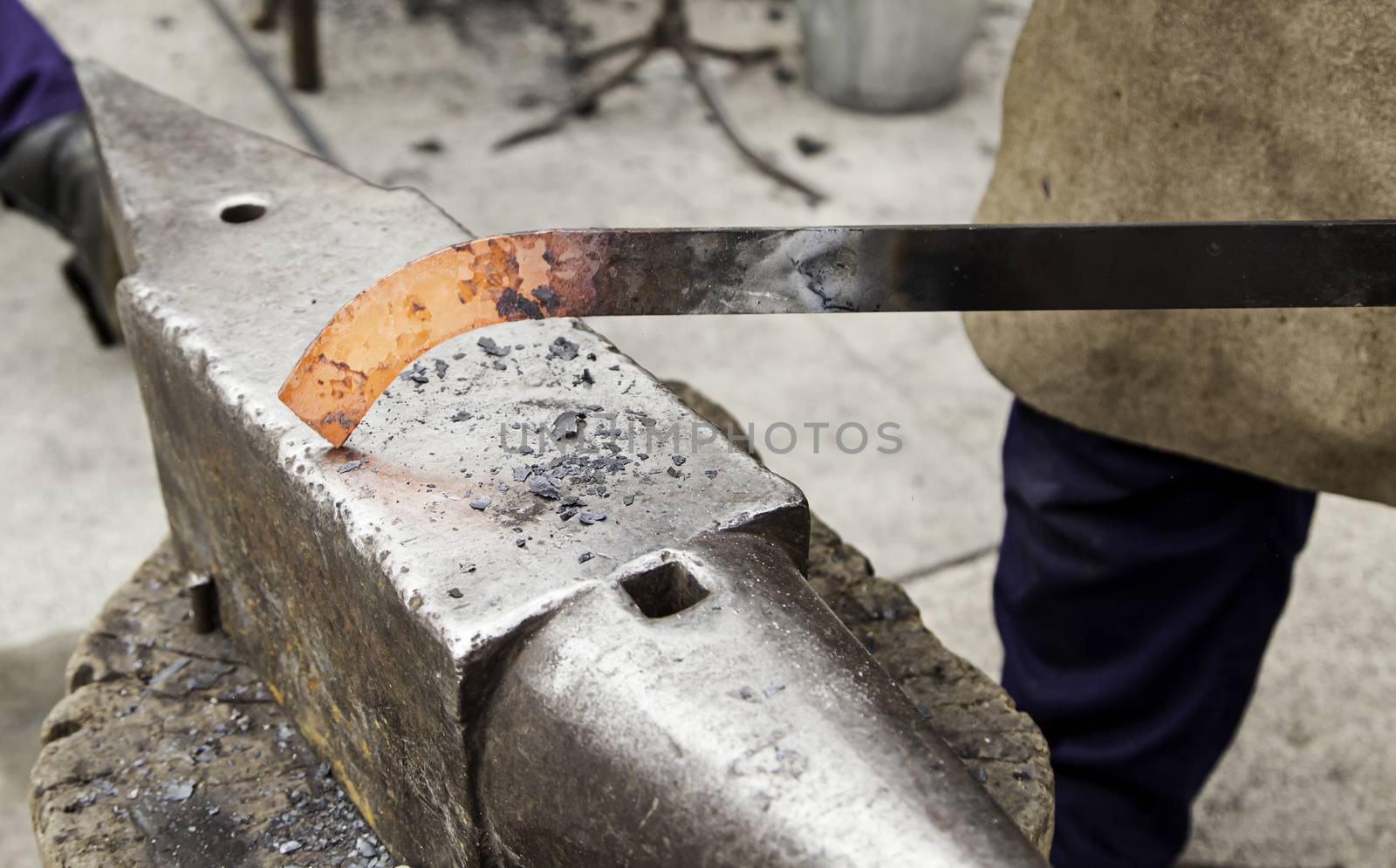 Red hot iron in a forge, working with hot iron, traditional work
