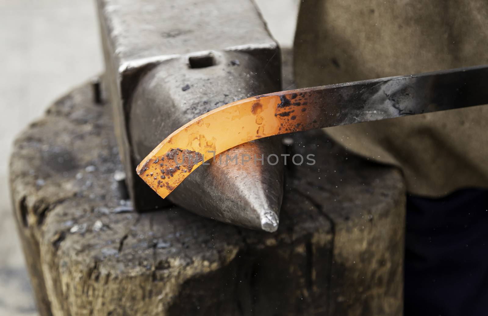 Red hot iron in a forge, working with hot iron, traditional work