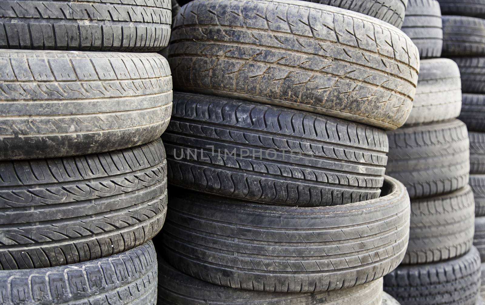 Old tires, scrapping for old wheels, trash and pollution