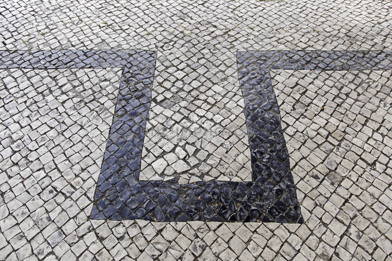 Mosaic floor, detail of a typical floor of the streets of Lisbon
