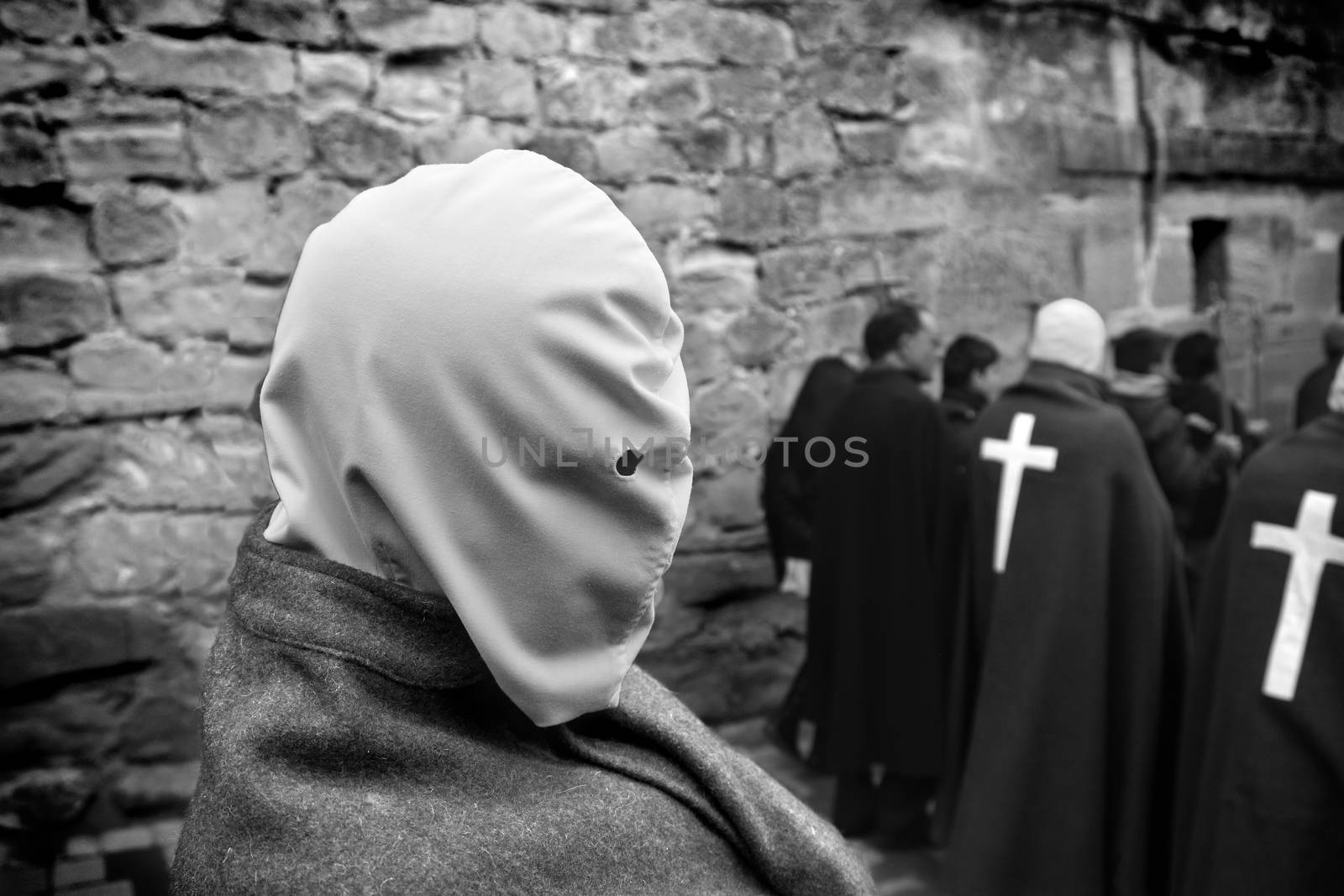 SAN VICENTE DE LA SONSIERRA, SPAIN - GOOD FRIDAY FRIDAY APRIL 6: Man does penance through self-flagellation during Easter holy procession on April 6, 2012, San Vicente de la Sonsierra, Spain.