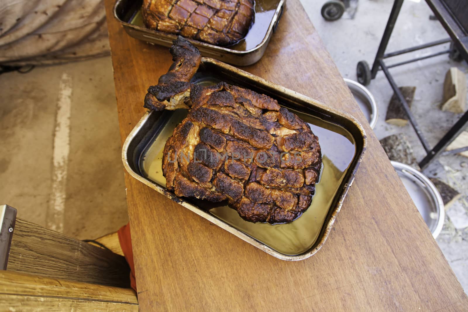 Roasted pork ham in a market