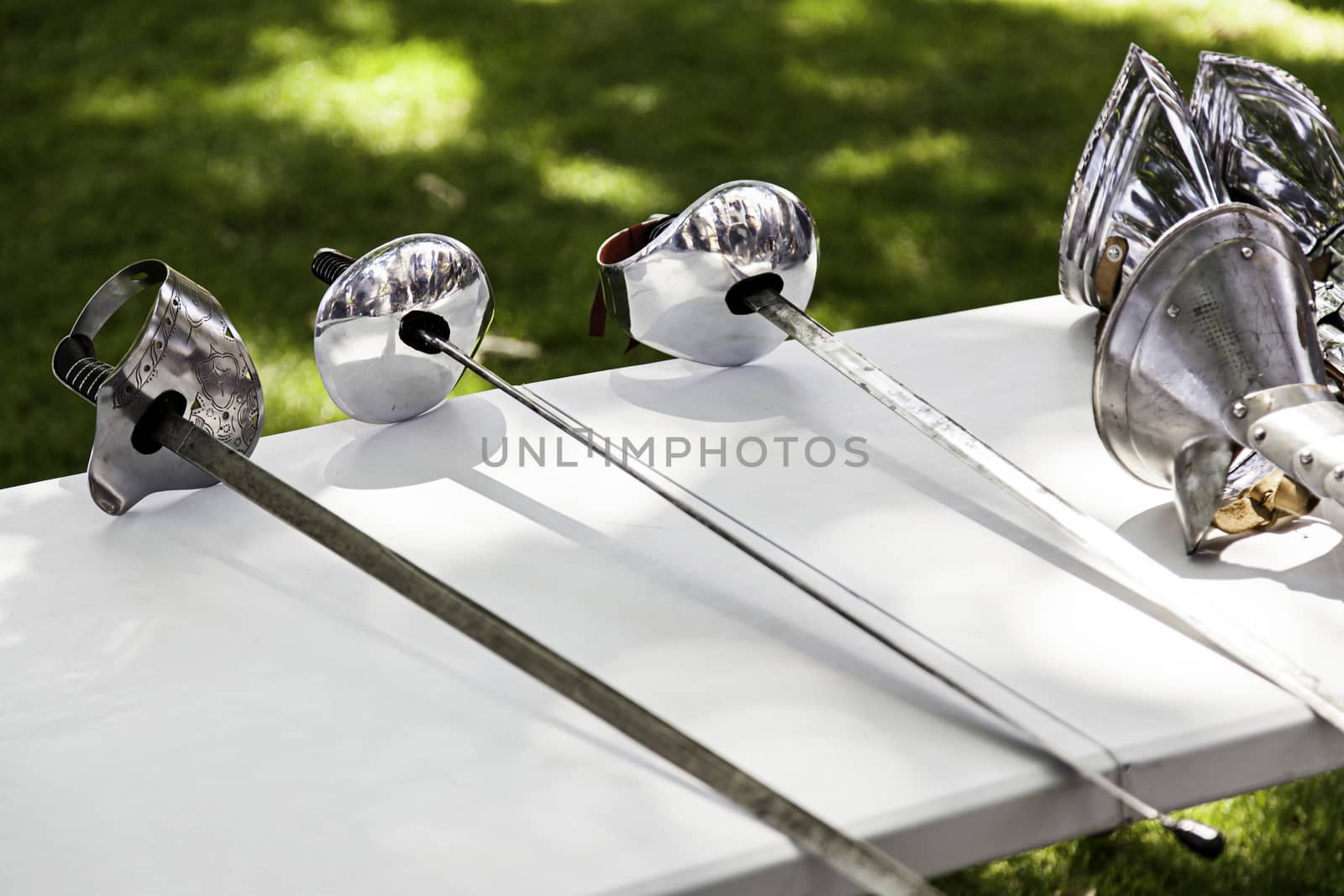 Old medieval swords, detail of old weapon of war, history and death, white weapon