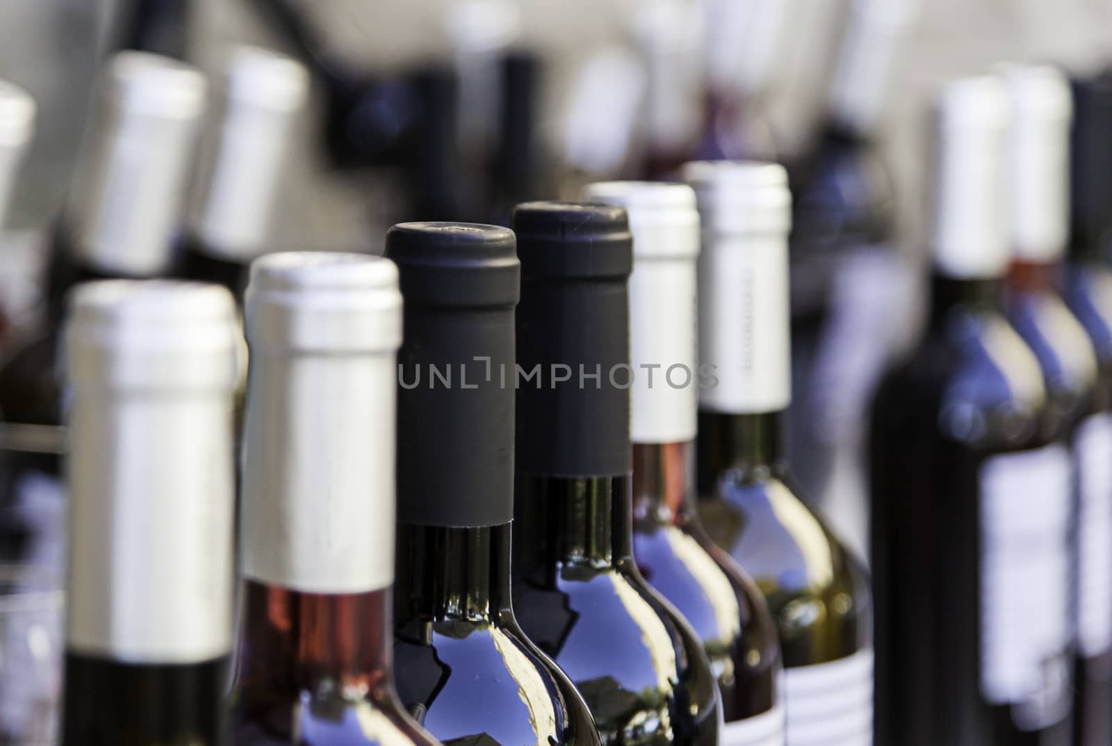 Bottles of wine, detail of luxury wines in a wine cellar, alcoholic drink