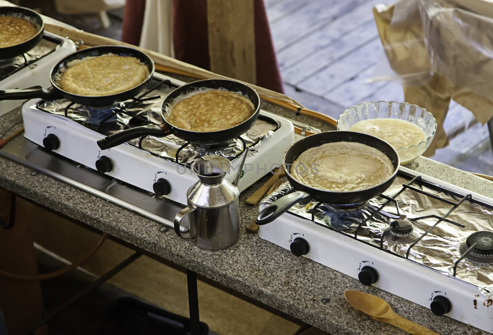 Pans with tortillas in a market