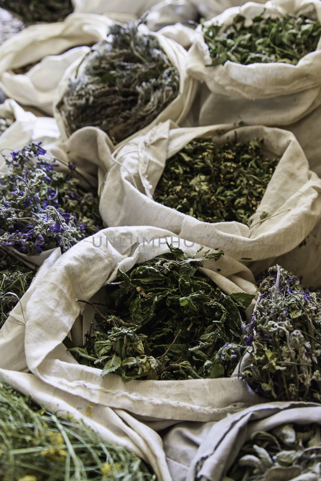 Aromatic herbs in a market, detail of herbal medicine and condiments, aroma and taste, health
