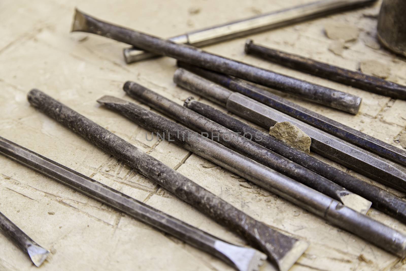 Old tools for stone carving handcrafted, detail of a manual craft