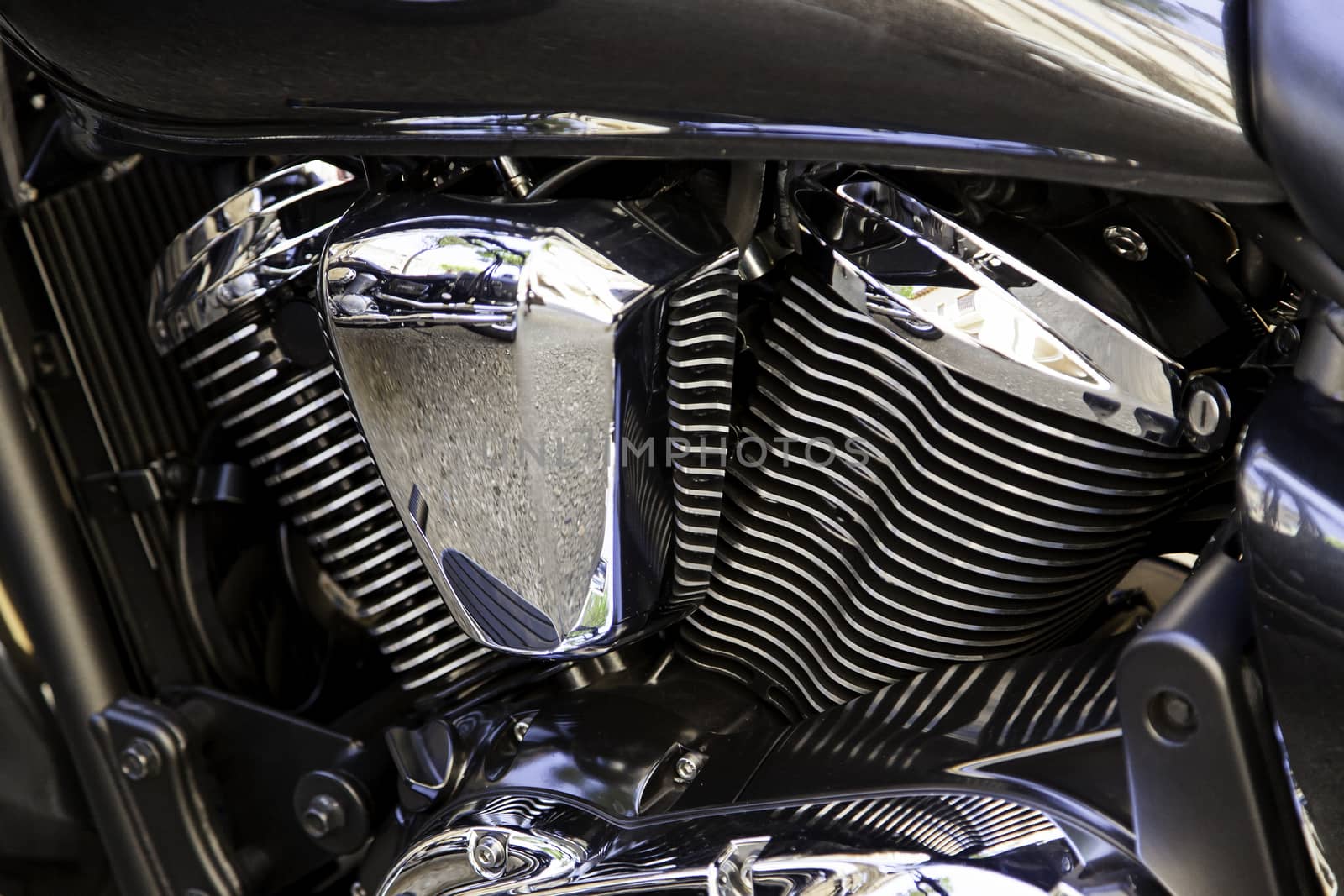Modern new engine of big displacement motorcycle, detail of speed and power
