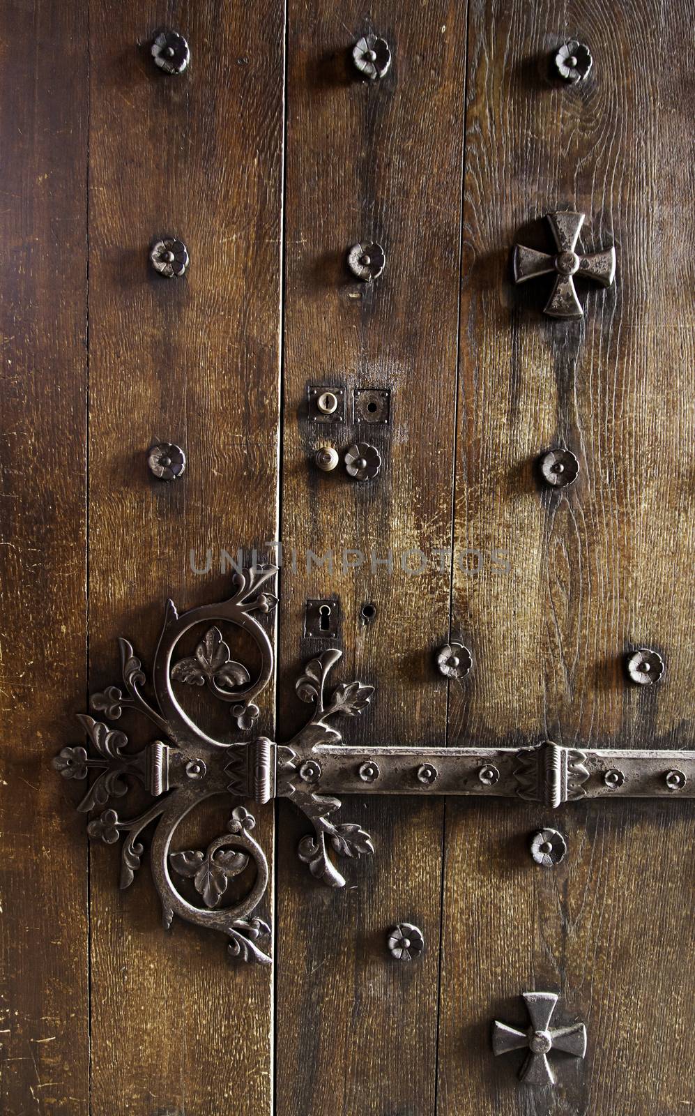 Old metalic decorated medieval lock, detail of protection and security