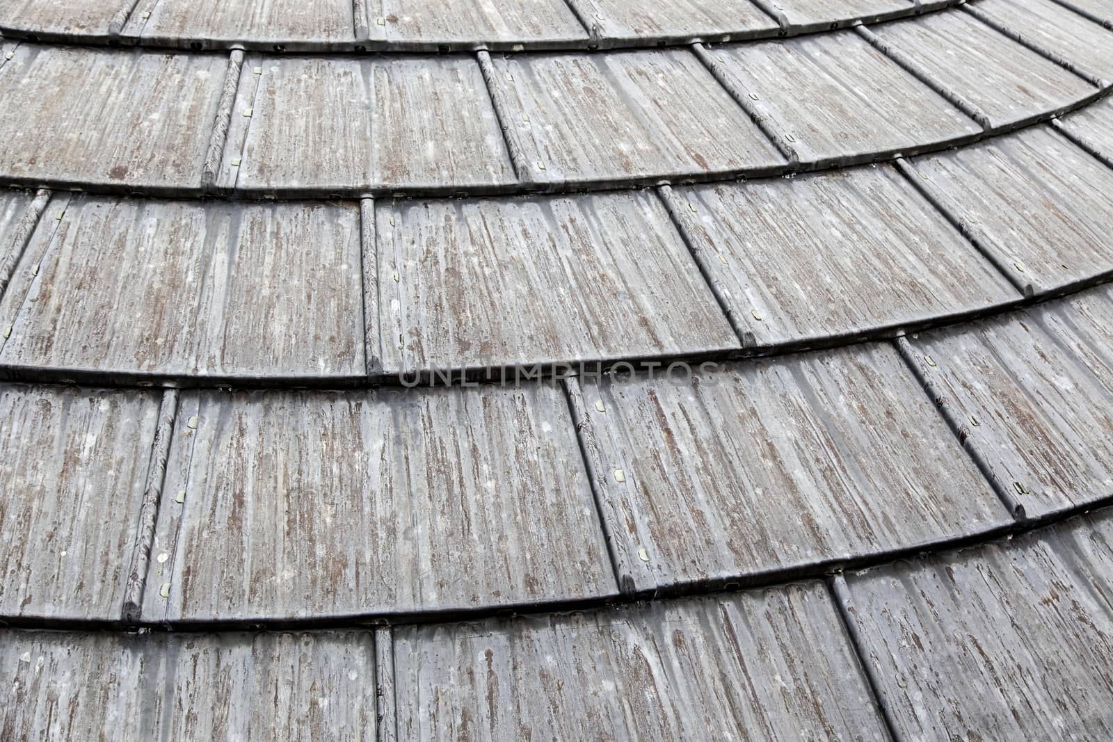 Old weathered metal roof, detail of protection against rain, rusty metal
