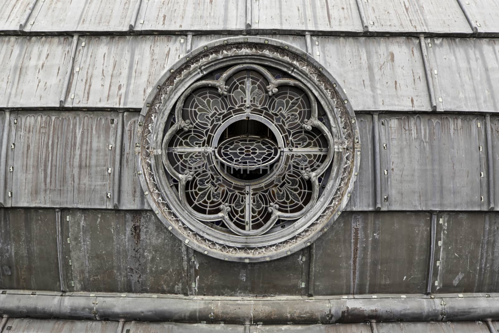 Old weathered metal roof, detail of protection against rain, rusty metal