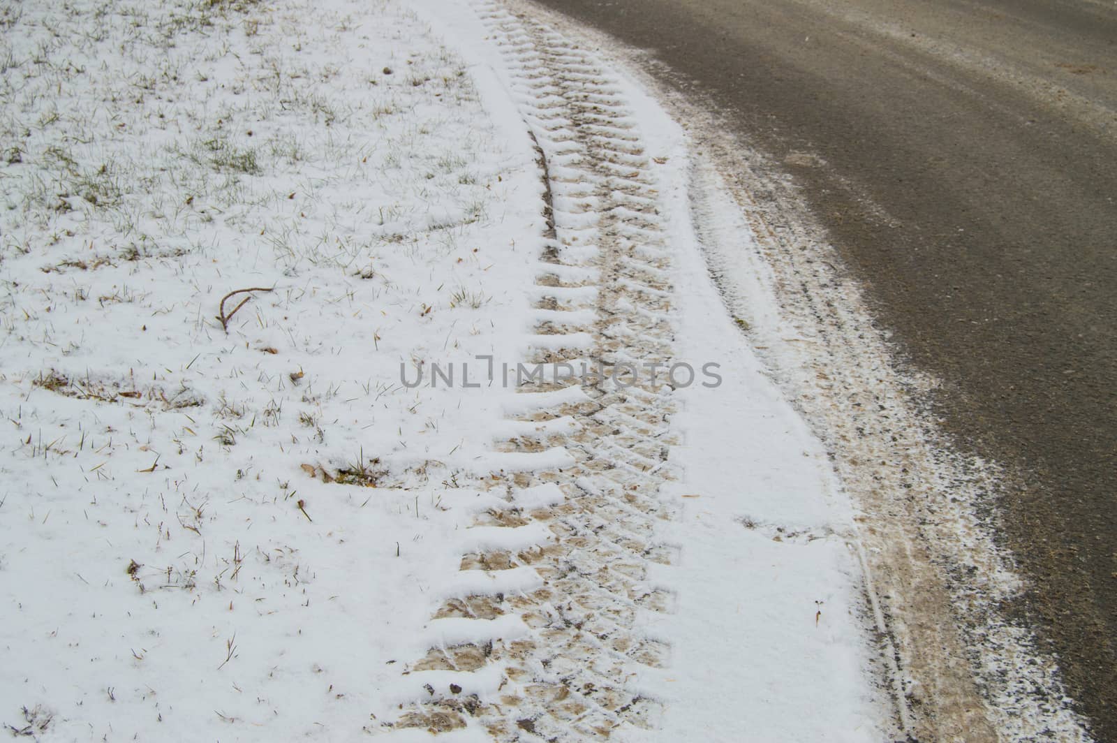 Abstract winter background on snow, close-up of the track from the car tire tread by claire_lucia