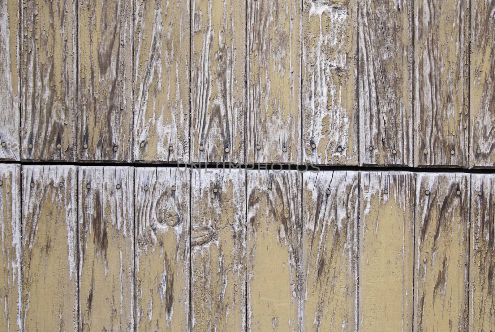 Wood damaged by time, detail of a wooden wall abandoned