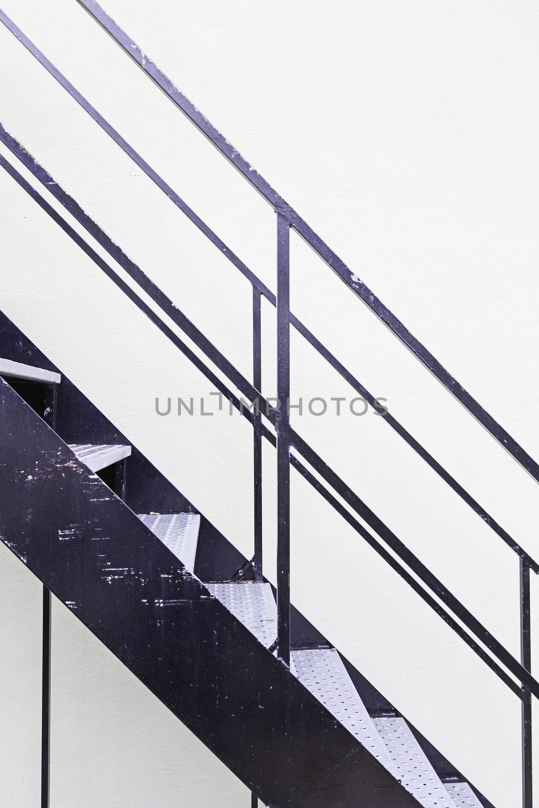 Metal ladder on a facade, detail of a building