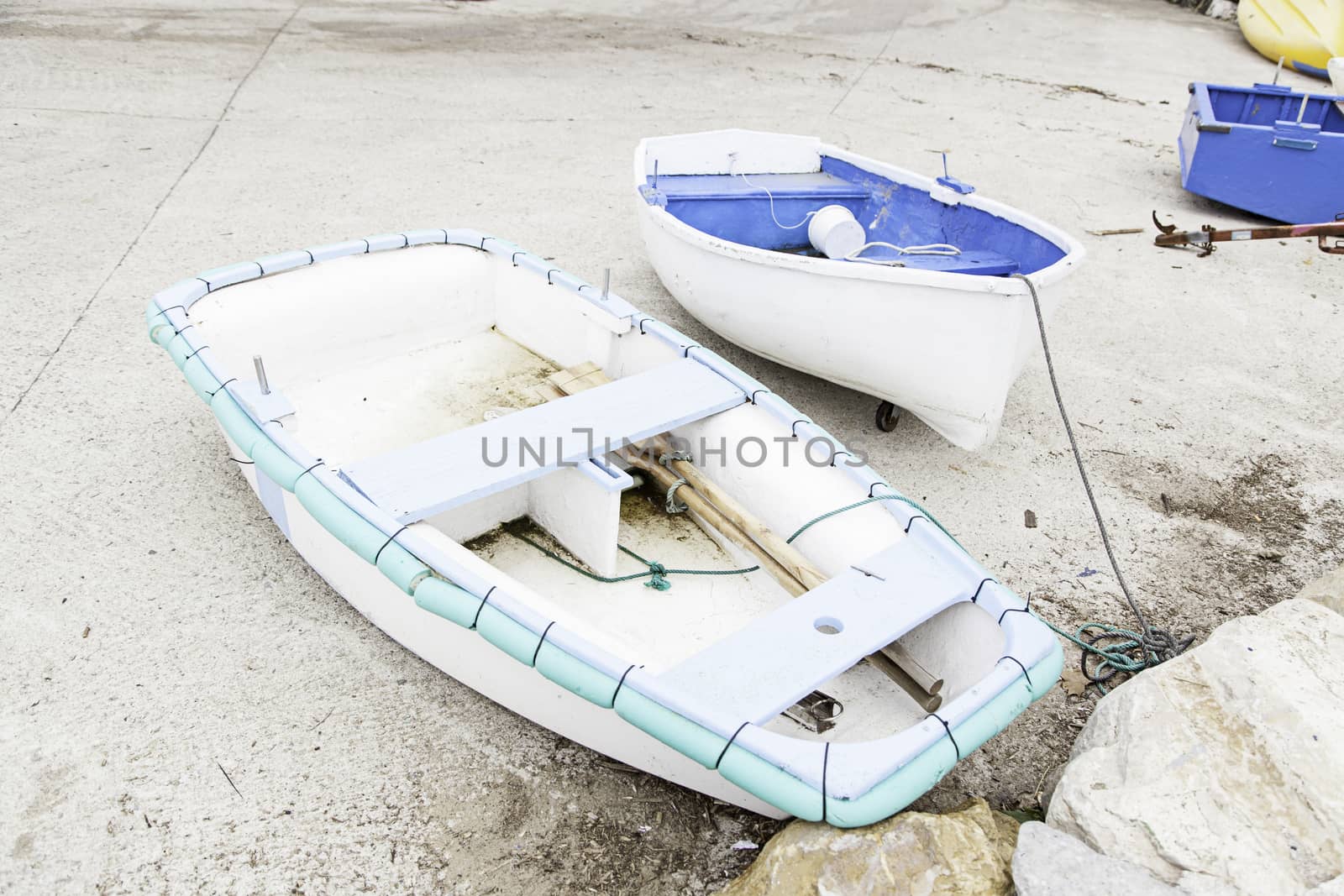 Boats moored at the dock, detail of a ship at sea, maritime transport