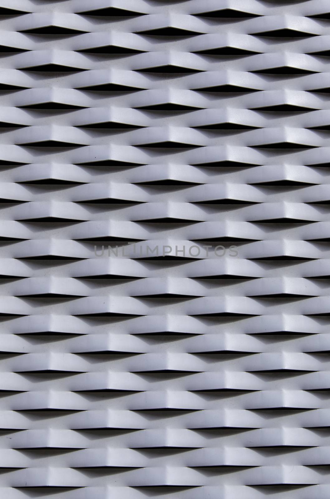 Metal protection grille with reliefs, safety detail and privacy