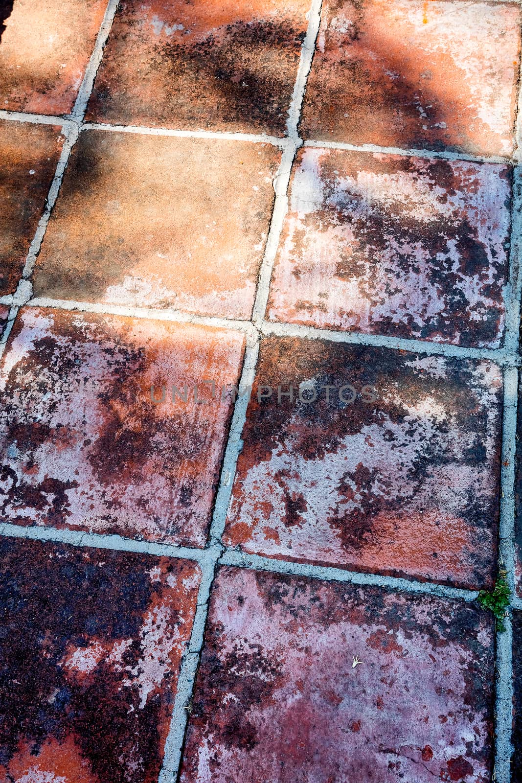 Old and dirty textured tile floor