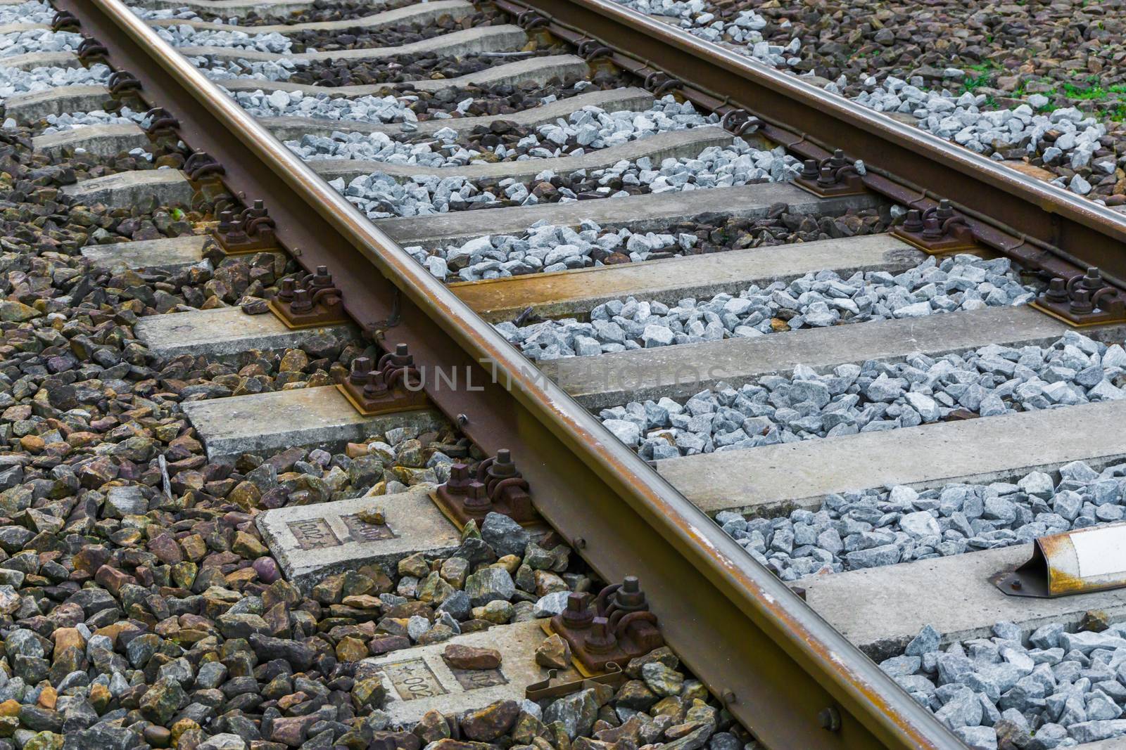 amazing closeup macro of a railroad track transport industry or travel background by charlottebleijenberg