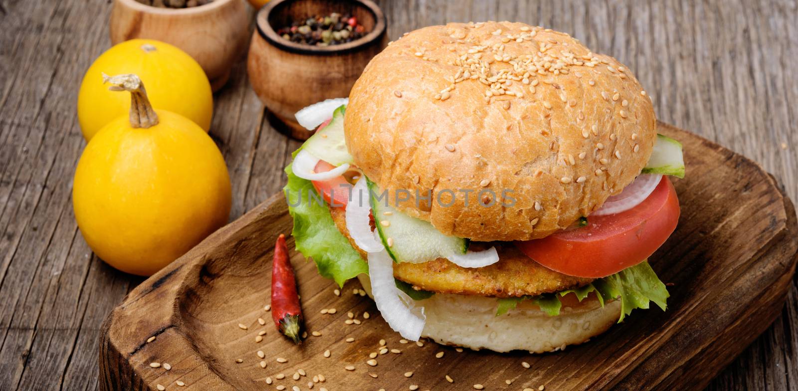 Diet hamburger with vegetables and pumpkin cutlet.Fast food