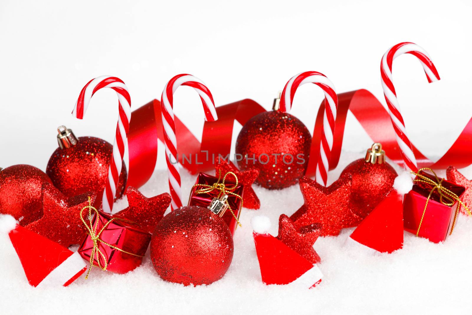 Beautiful red christmas decor on snow