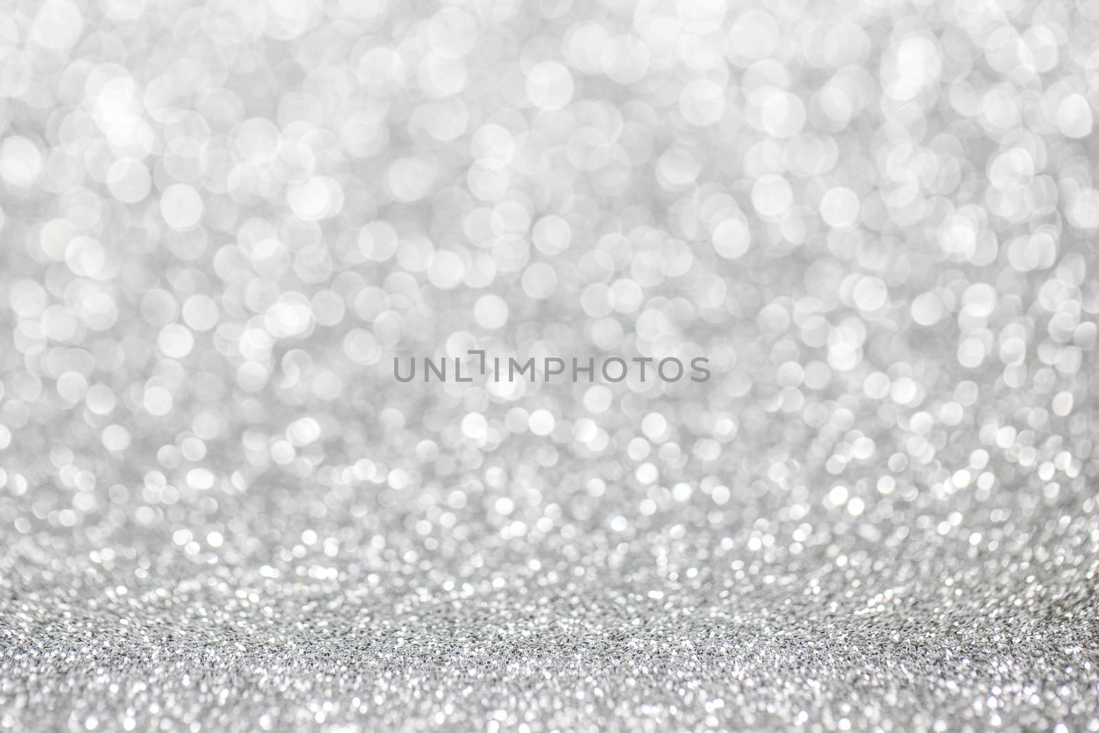 Abstract silver glitter light bokeh holiday party background