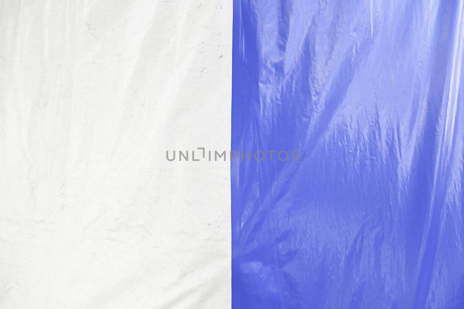 Blue and white canvas, detail of a canvas painted blue and white, and safety protecion