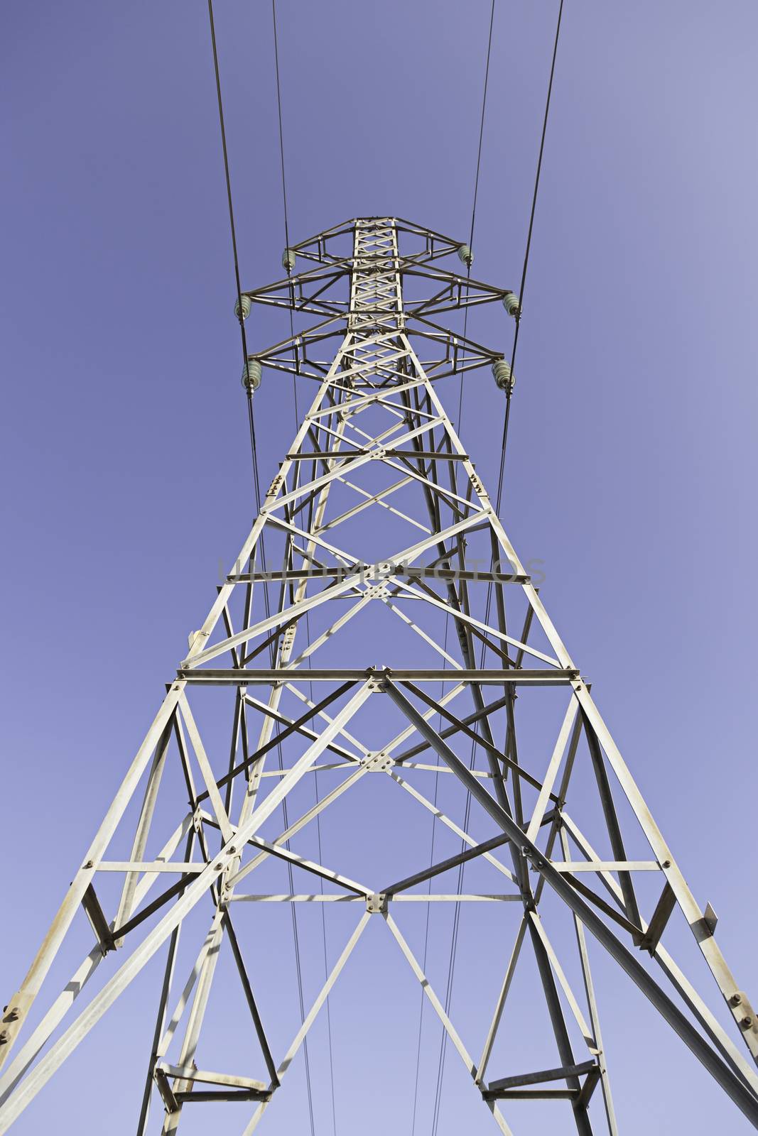 Pylon, detail of a tower for the transmission of electrical energy, the environment, energy
