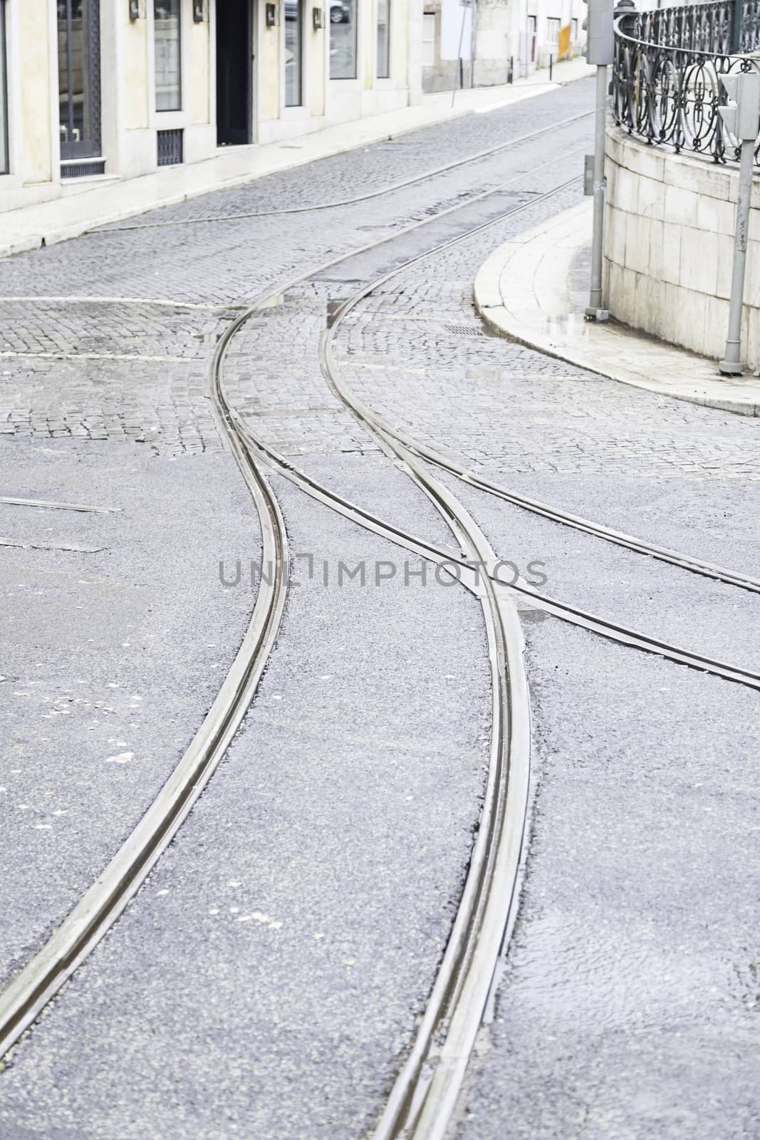 Tram tracks on a street in Lisbon by esebene