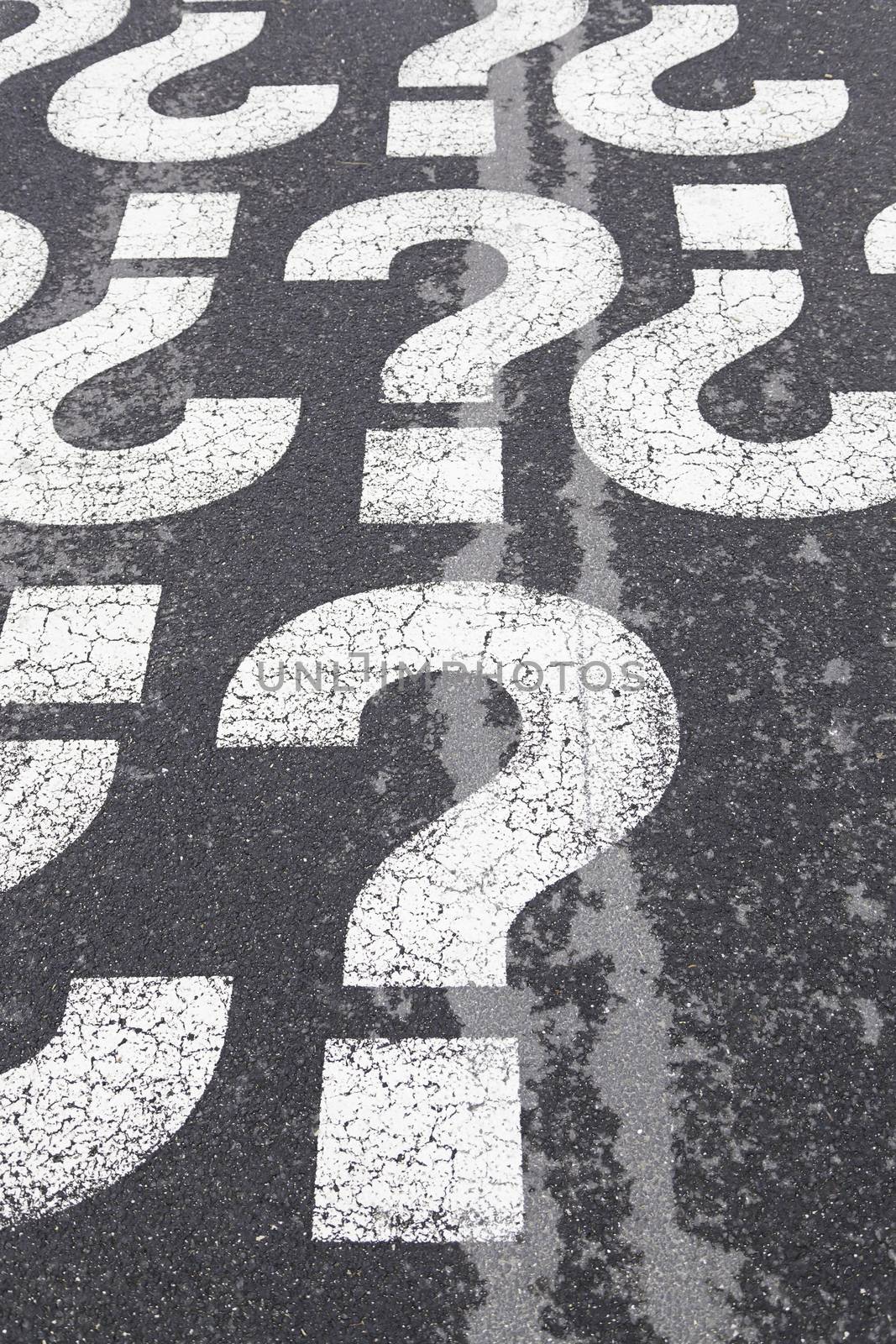 Sign question on asphalt, detailed interrogation signal, information