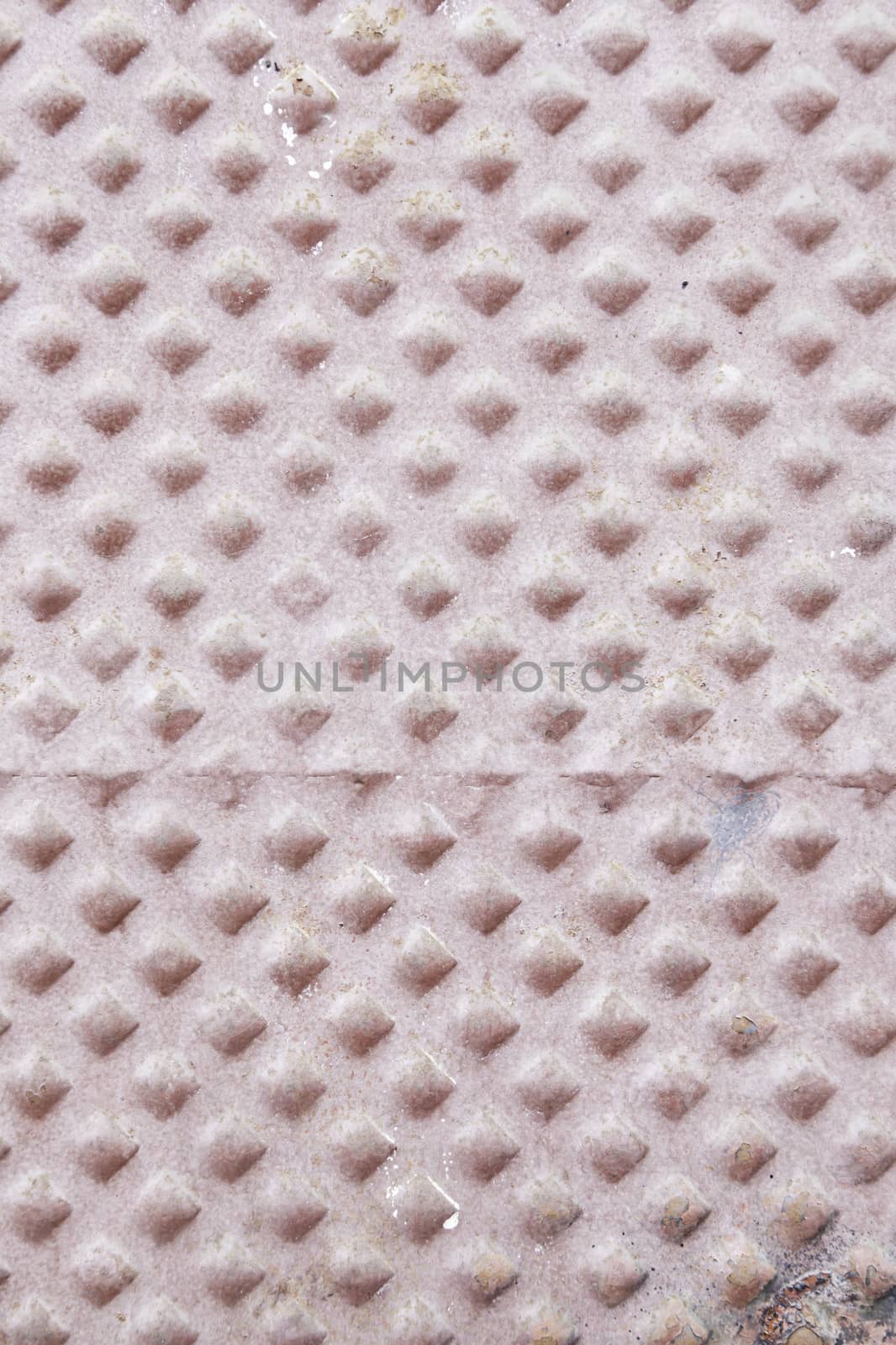 Tile floor in the city, detail of a cement tile, decoration and safety