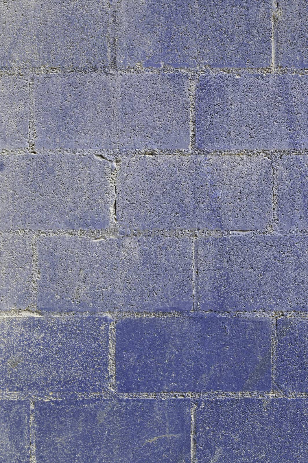 Background of blue painted wall, detail of a wall in the city decorated, textured background