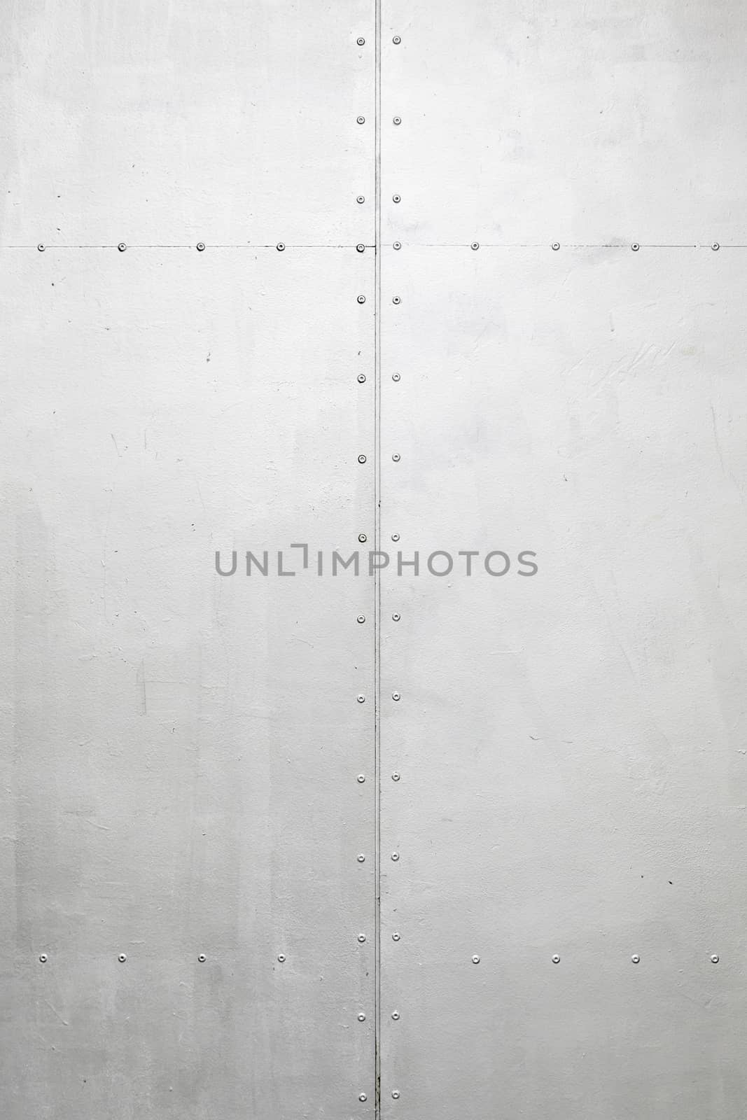 Metallic background with texture detail of a coated metal wall, protection and security
