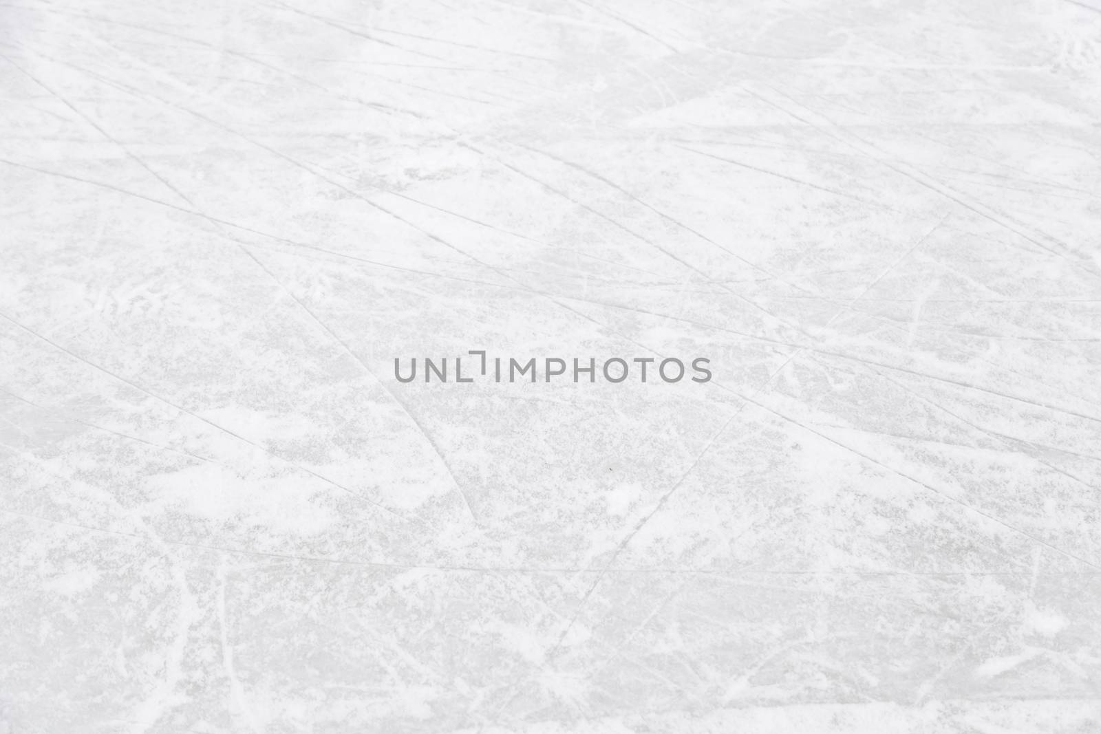 Ice rink floor, detail of a textured background ice, sport