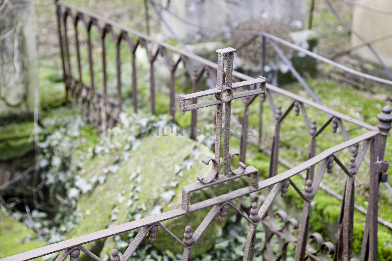 Cross on a grave, detail in the city