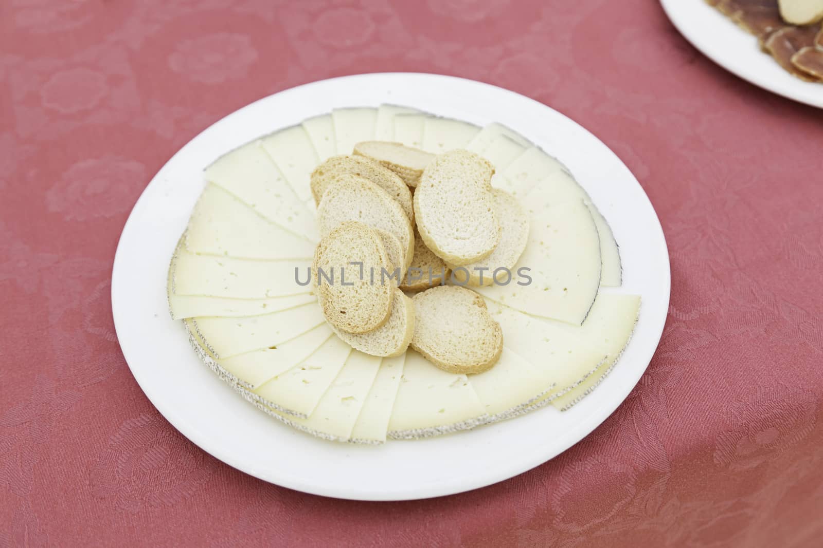 Cheese plate with bread, detail of healthy food, daily food, milk product